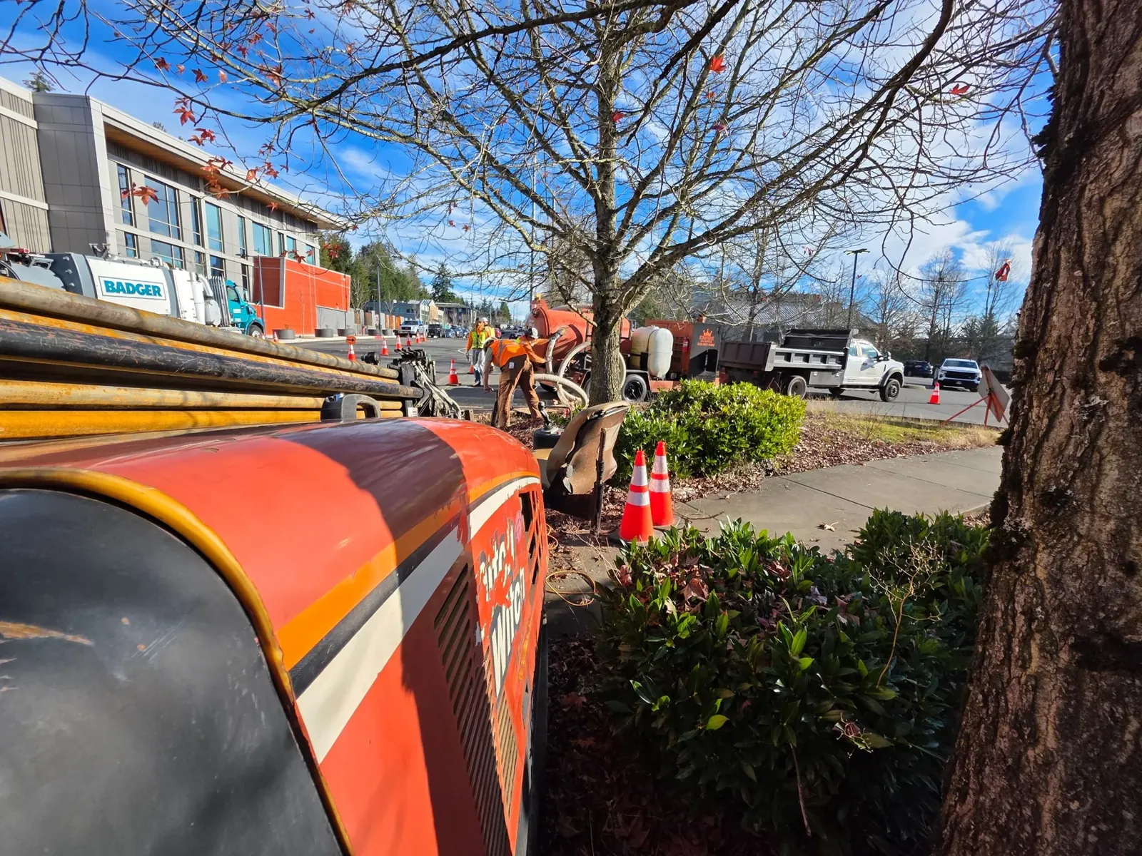 Empire vacuum equipment positioned at a street-side work area